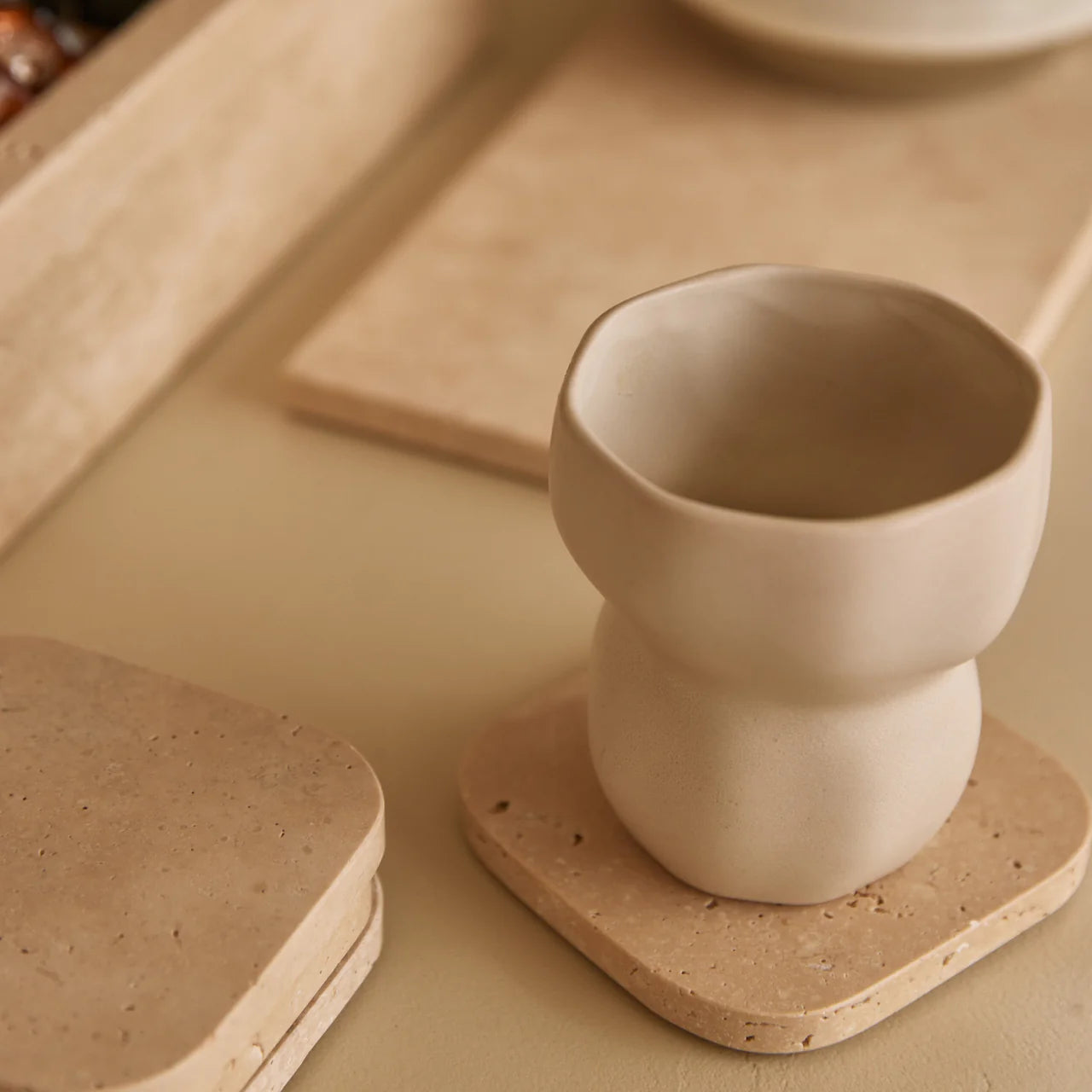 Travertine onderzetters organisch – Set van 4