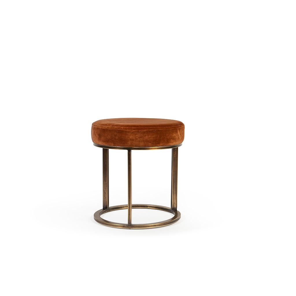 Pouf with velvet seat.