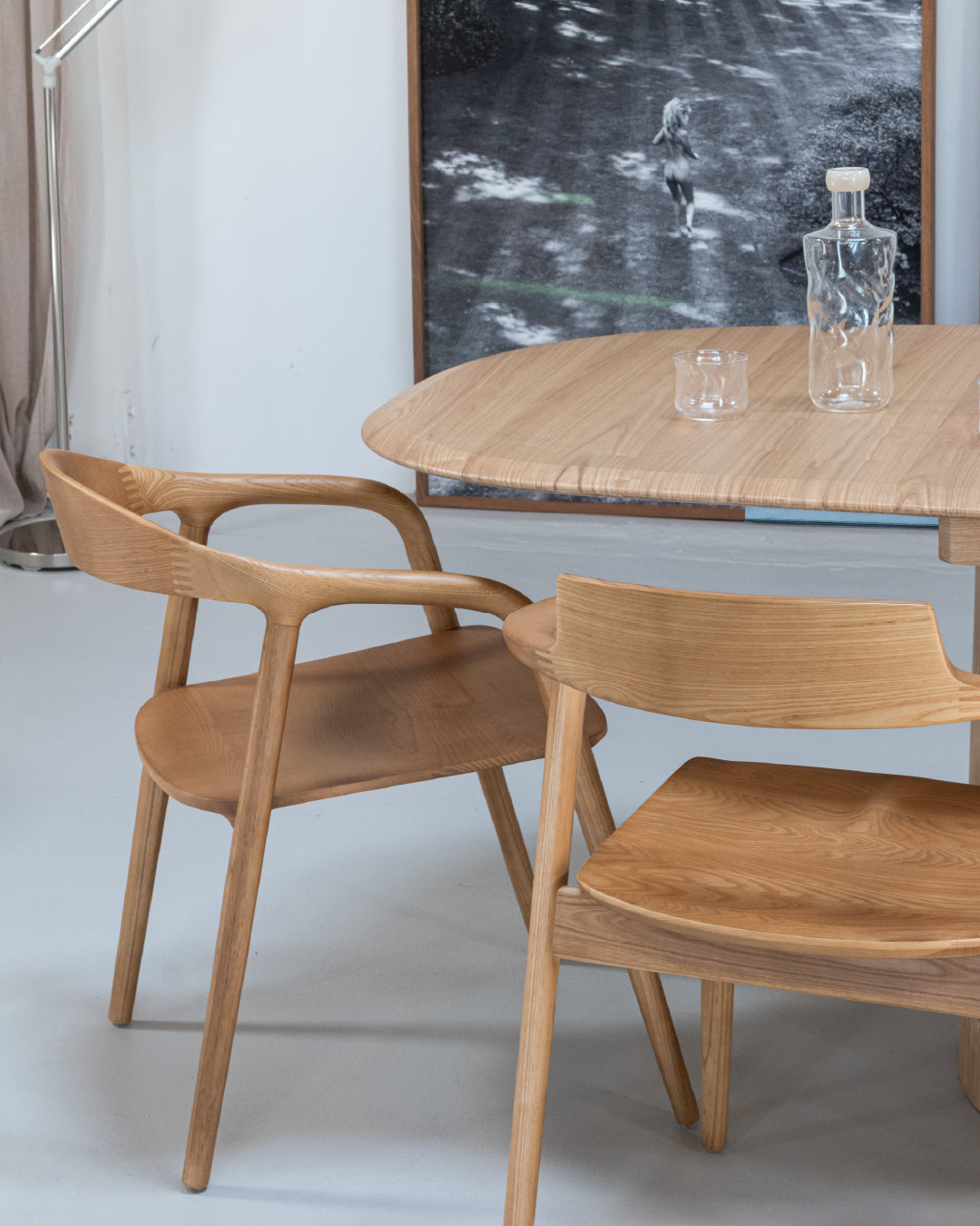 Houten eetkamerstoel gebogen rugleuning naturel